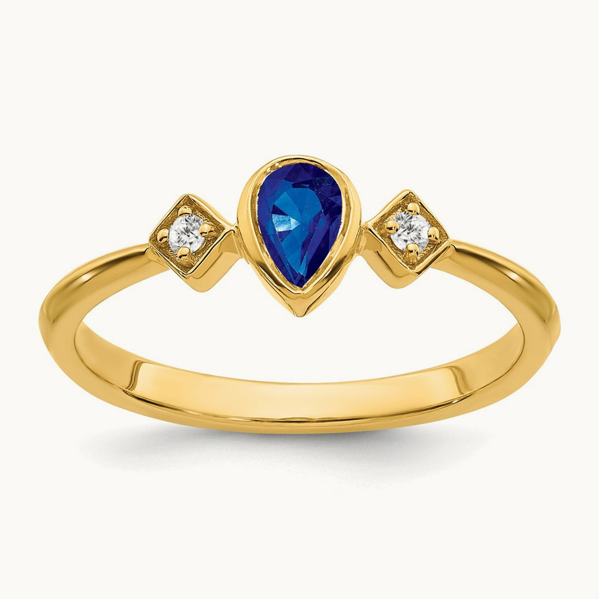 Pear Bezel Sapphire and Diamond Ring — 14K Yellow Gold, 7