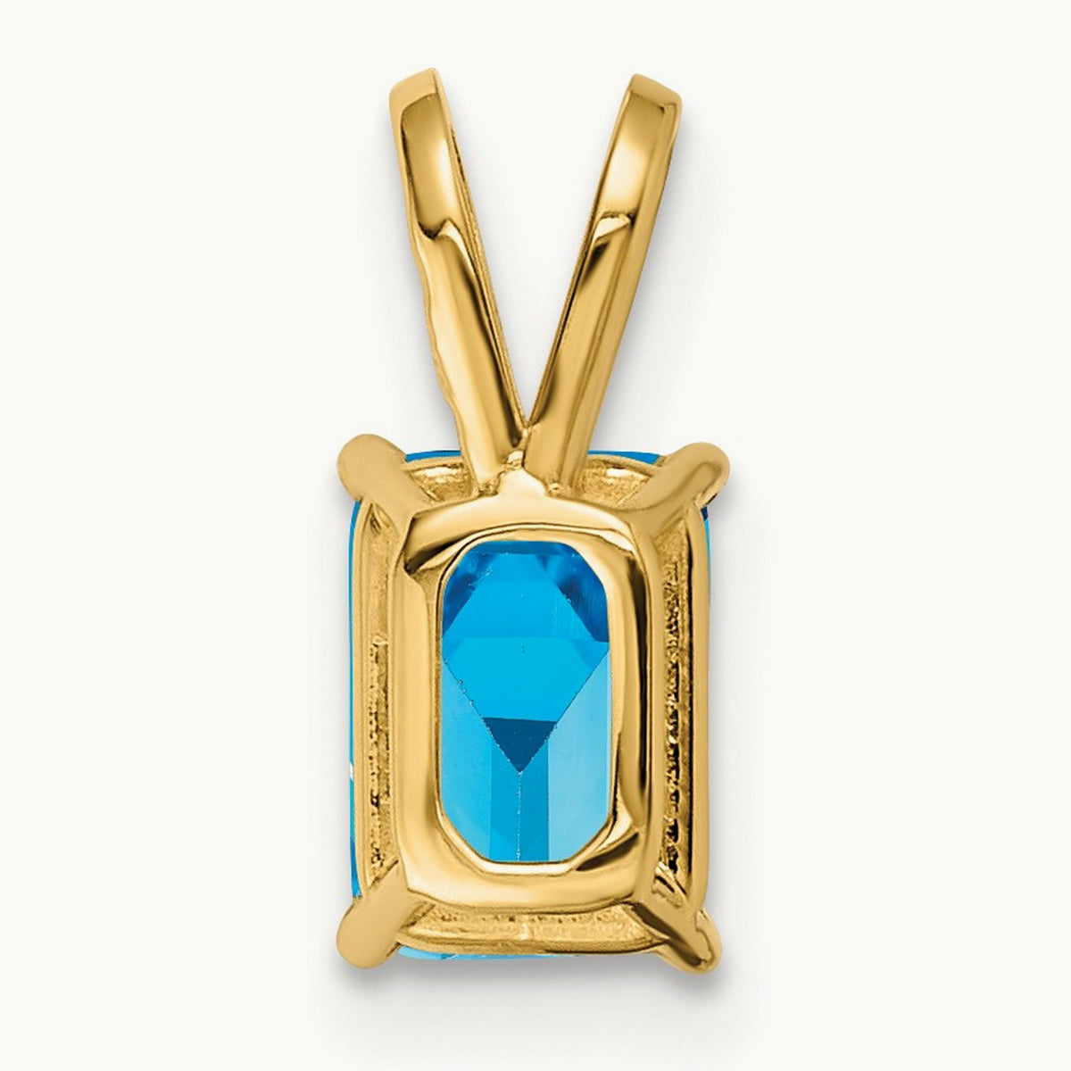 Emerald Cut Blue Topaz Pendant — 7x5mm
