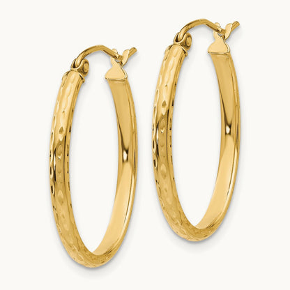 Lightweight Diamond-cut Oval Hoop Earrings — 14K Yellow Gold, 20mm