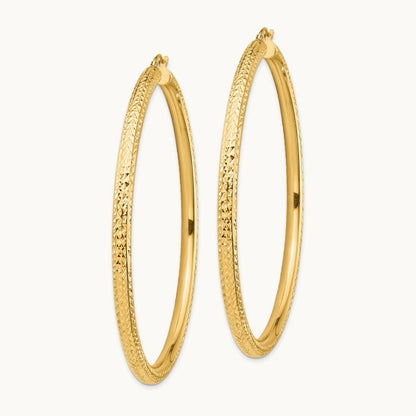 Diamond-cut Lightweight Tube Hoop Earrings — 14K Yellow Gold, 4x70mm