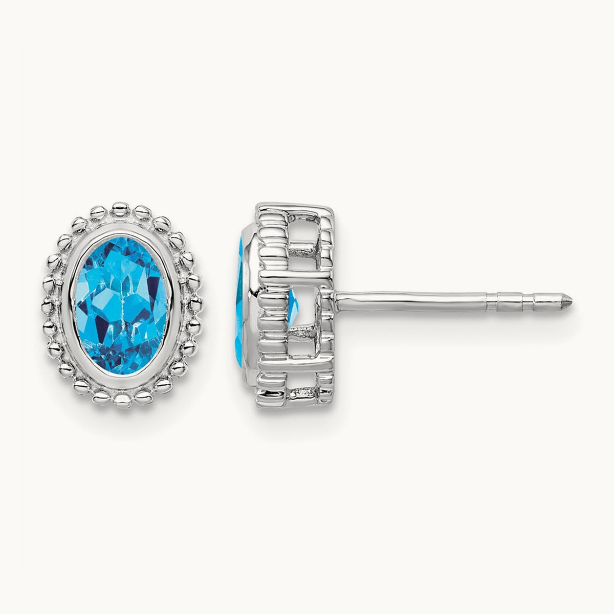 Oval Blue Topaz Post Earrings — 14K White Gold