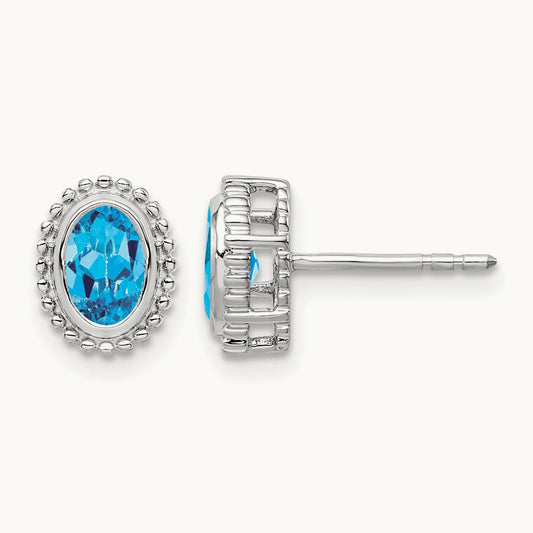 Oval Blue Topaz Post Earrings — 14K White Gold