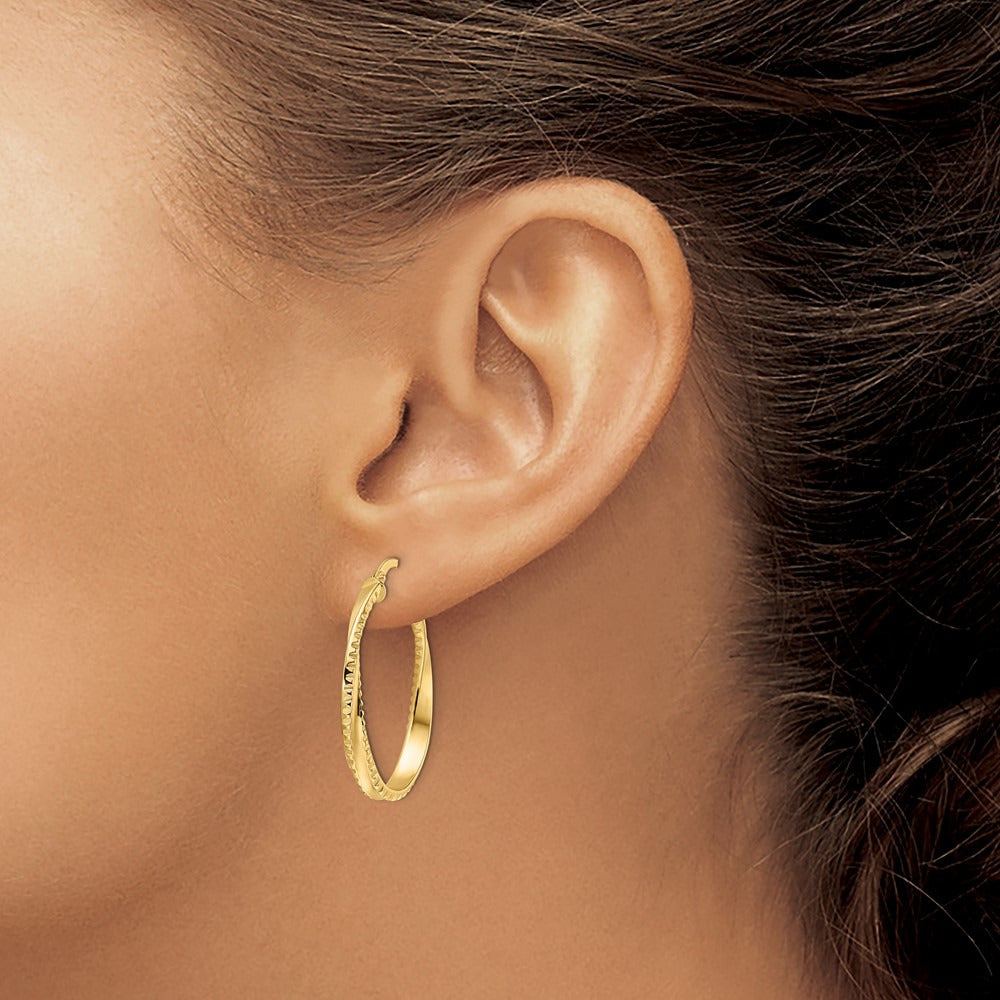 Polished Twisted Oval Hoop Earrings — 22mm
