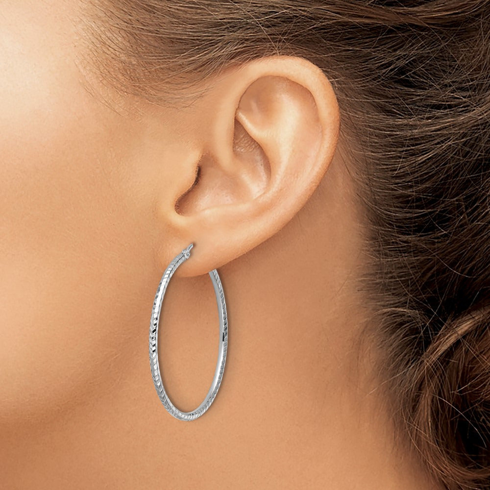 Diamond-cut Round Tube Hoop Earrings — 10K White Gold