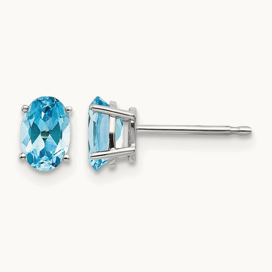 December/Blue Topaz Post Earrings — photo set
