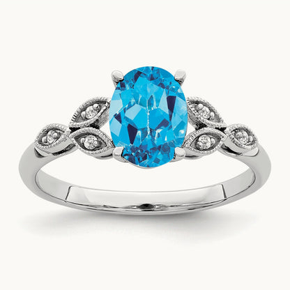 Oval Blue Topaz and Diamond Ring, 14K White Gold