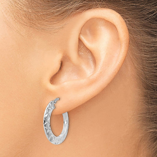 RH- Polished & Textured Hoop Earrings — Leslie's — photo set