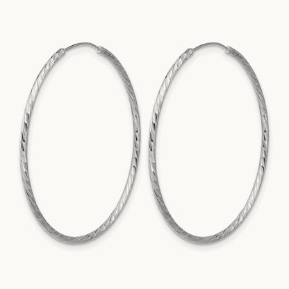 Rhodium-plated Diamond-cut Endless Hoop Earrings — 1.25mm