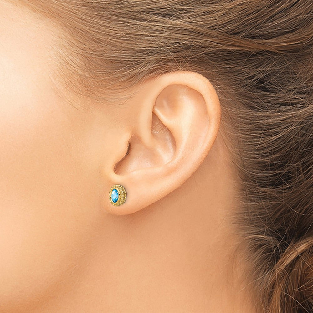 Oval Blue Topaz Post Earrings — 14K Yellow Gold