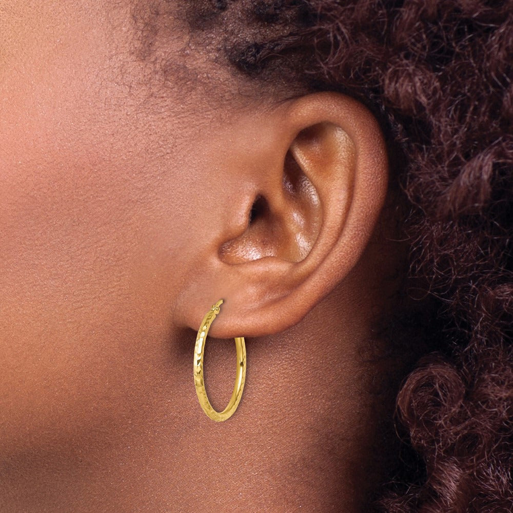 Diamond-cut Round Tube Hoop Earrings — 10K Yellow Gold