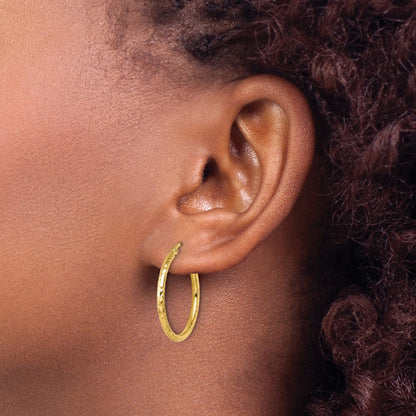 Diamond-cut Round Tube Hoop Earrings — 10K Yellow Gold