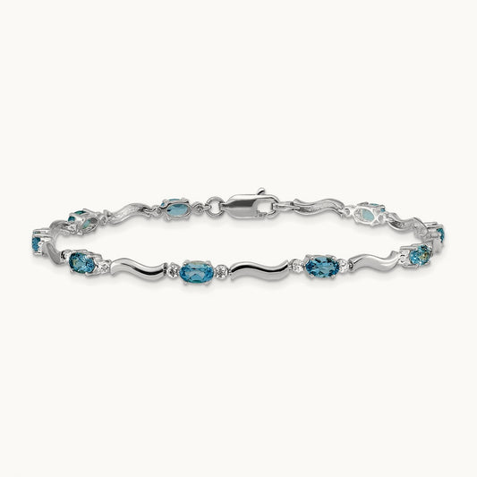 Fancy Diamond and Blue Topaz Bracelet — 14K White Gold