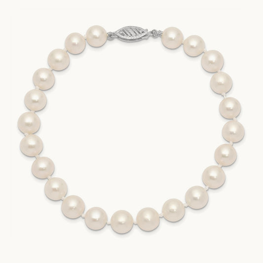 WG 7- Near Rnd White Freshwater Cultured Pearl Bracelet, 8mm, 14K