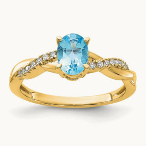 Oval Blue Topaz and Diamond Ring — 14K Yellow Gold, 7