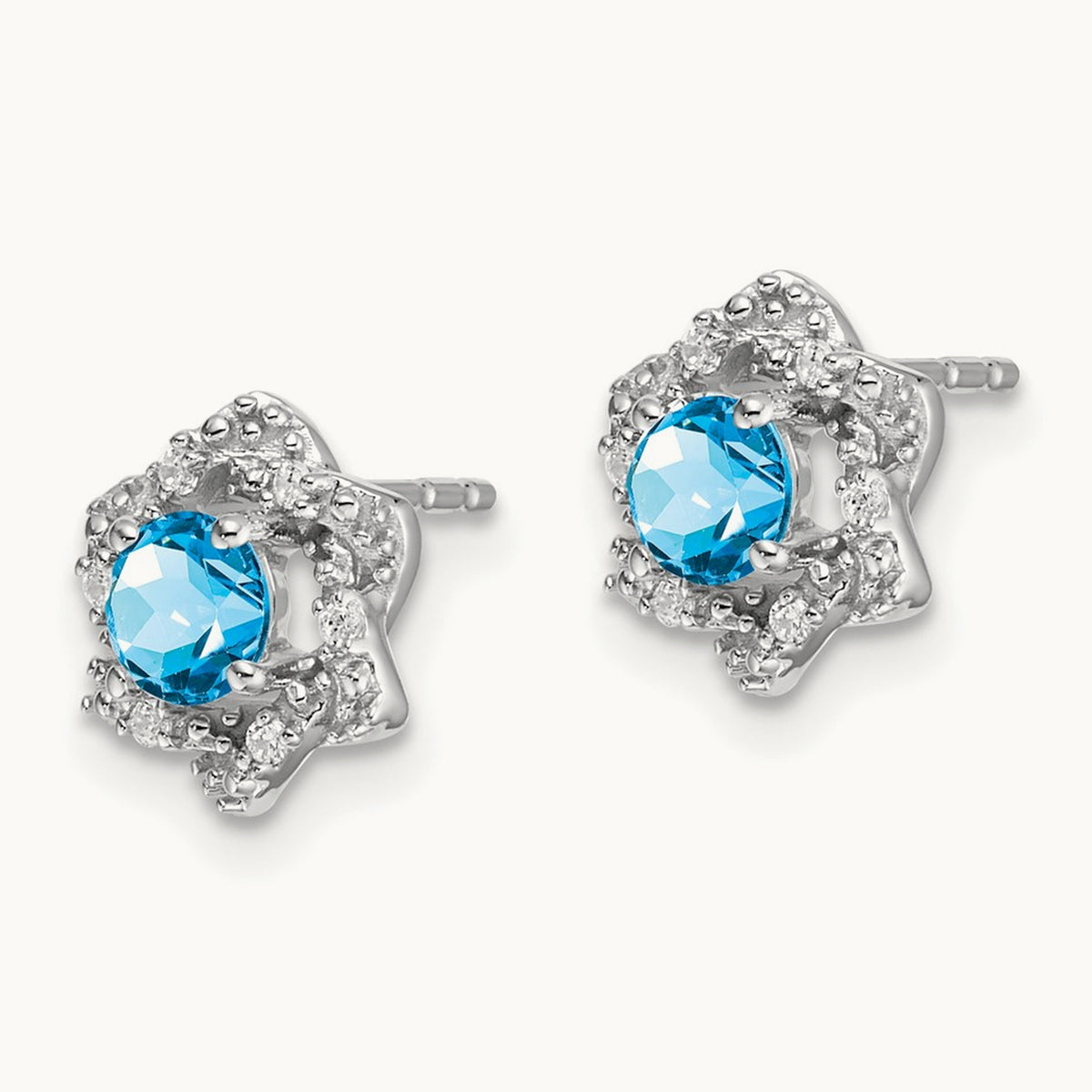 Blue Topaz and Diamond Post Earrings — photo set