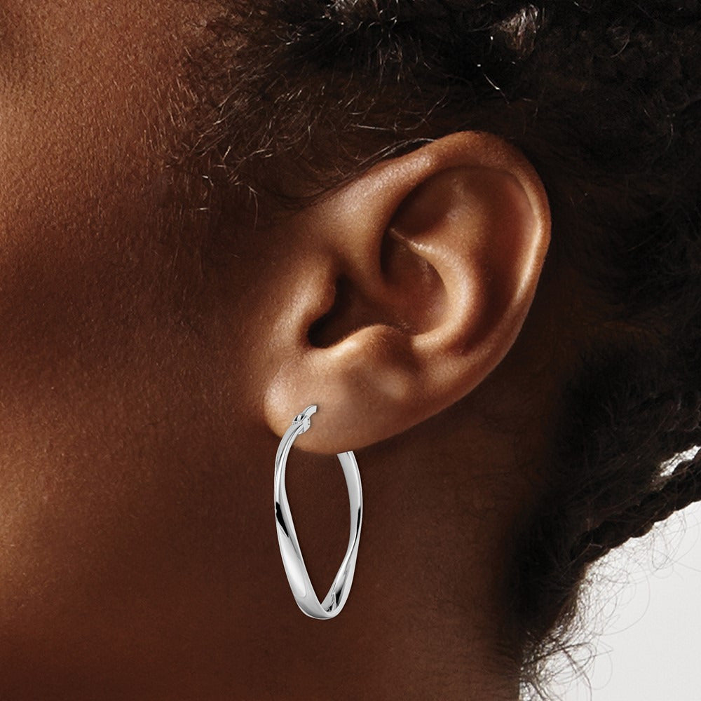 RH- Polished Hoop Earrings — Leslie's — photo set