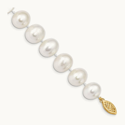 11- White Near Round Freshwater Cultured Pearl Bracelet, 14K