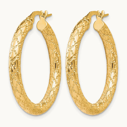Polished and Textured Hinged Hoop Earrings — Leslie's — photo set