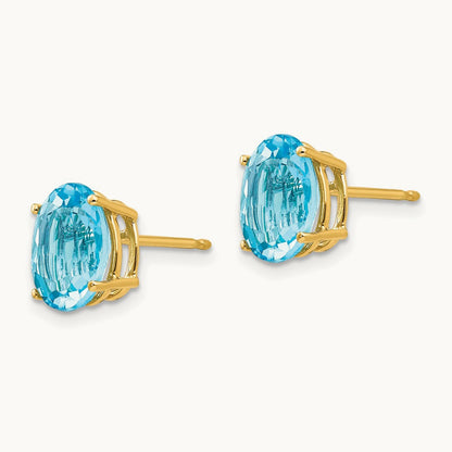 9x7mm Oval Blue Topaz Earrings, 14K