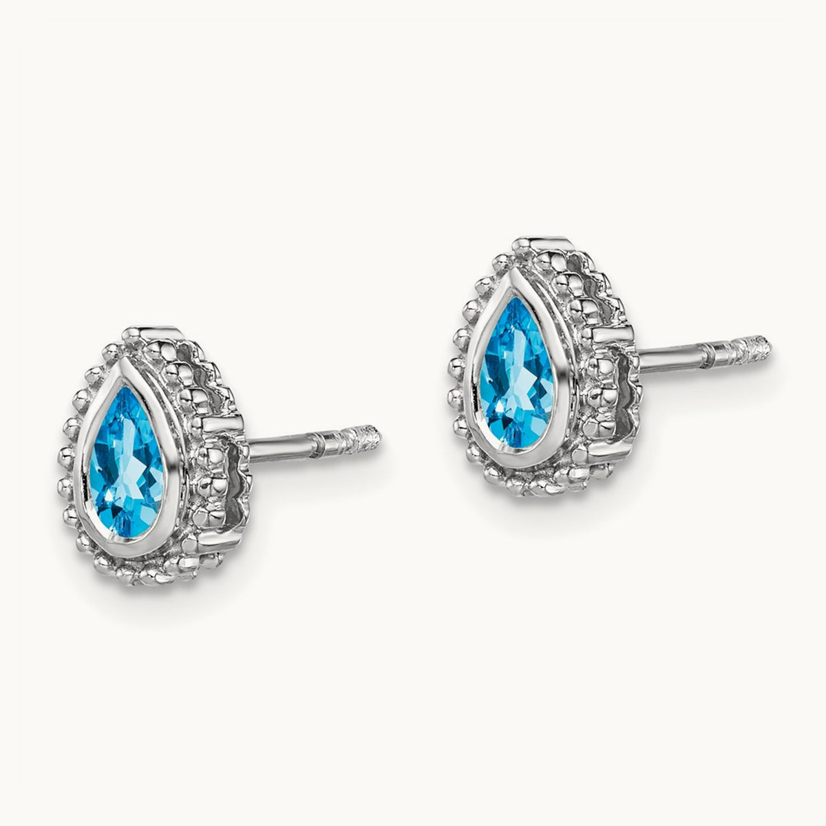 Pear Blue Topaz Post Earrings — 14K White Gold