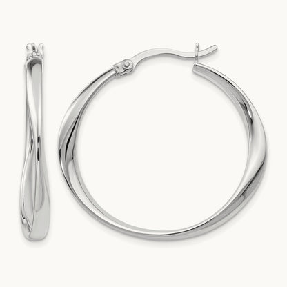 RH- Polished Hoop Earrings — Leslie's — photo set