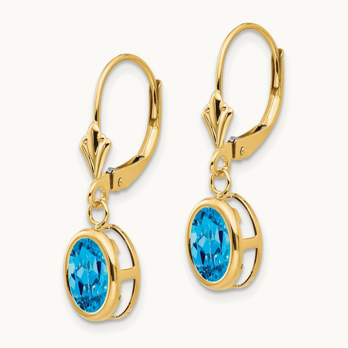 Oval Blue Topaz Leverback Earrings — 14K Yellow Gold, 27mm, 8x6mm