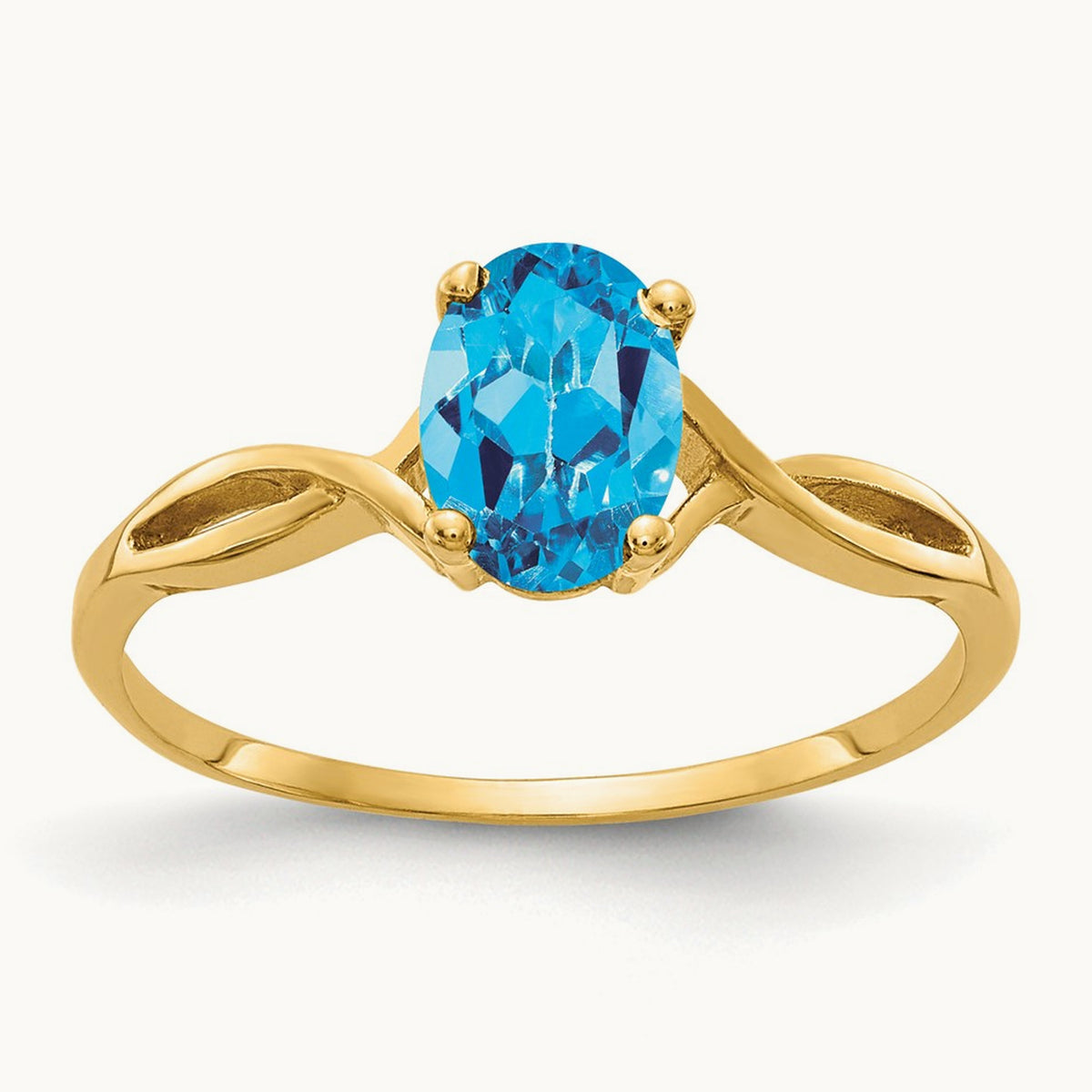 7x5mm Oval Blue Topaz ring, 14K