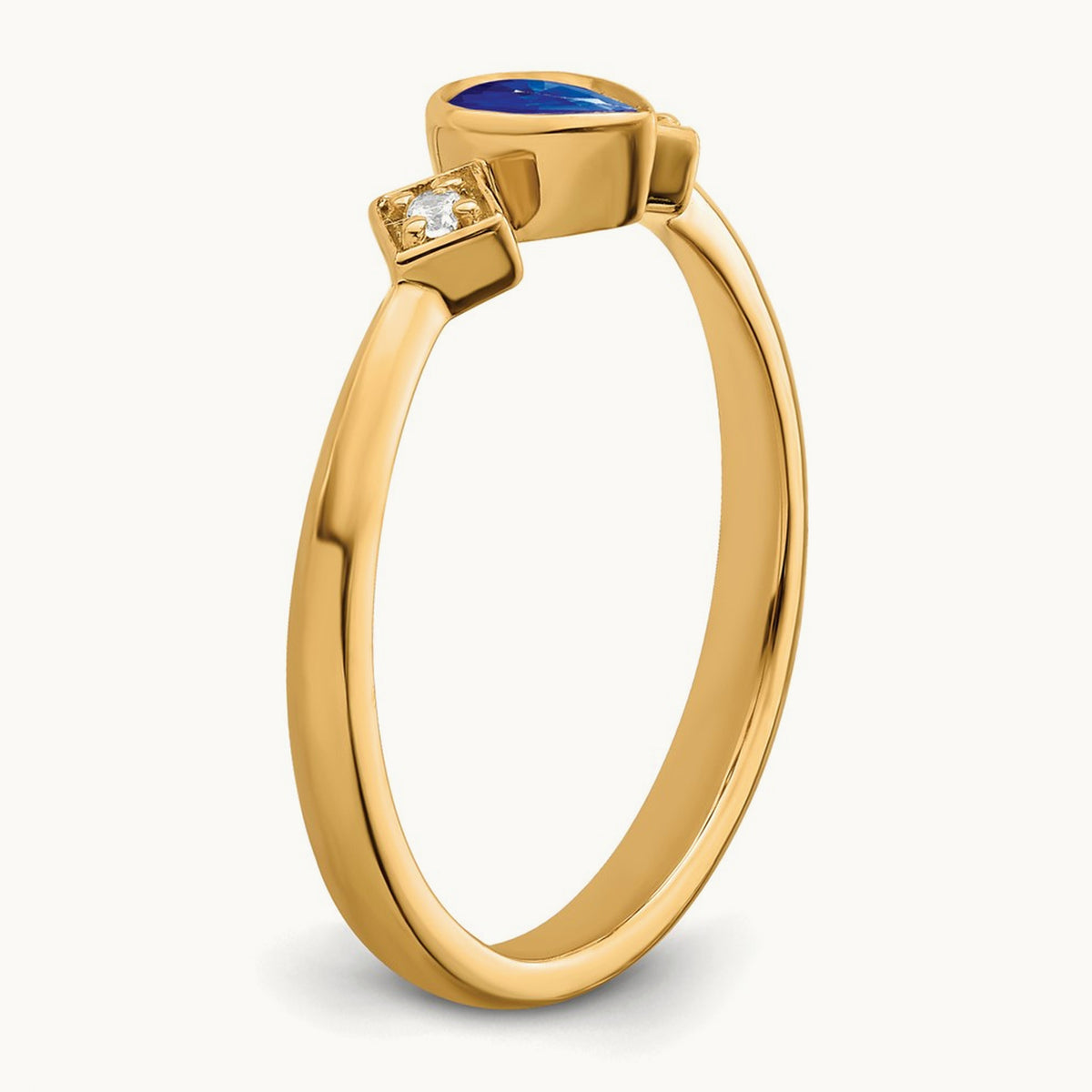 Pear Bezel Sapphire and Diamond Ring — 14K Yellow Gold, 7