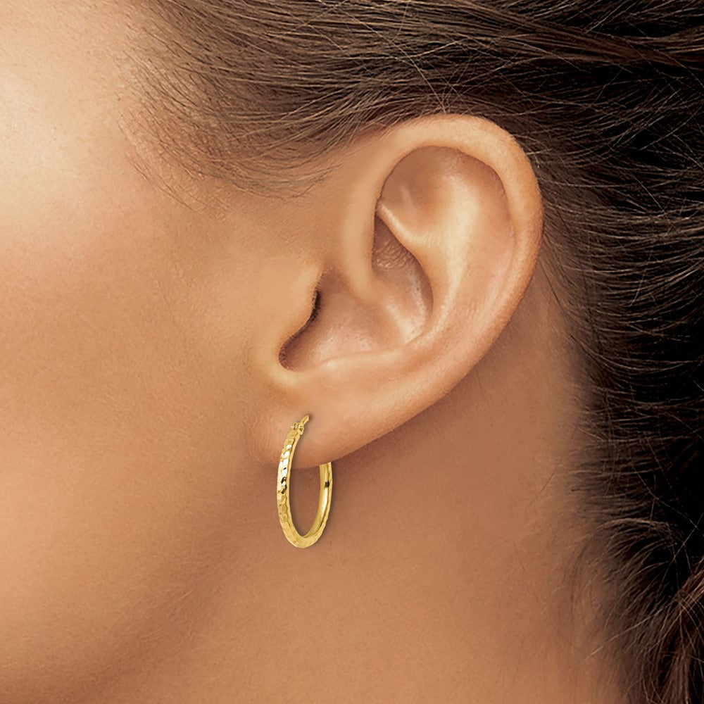 Diamond-cut Round Tube Hoop Earrings — 10K Yellow Gold