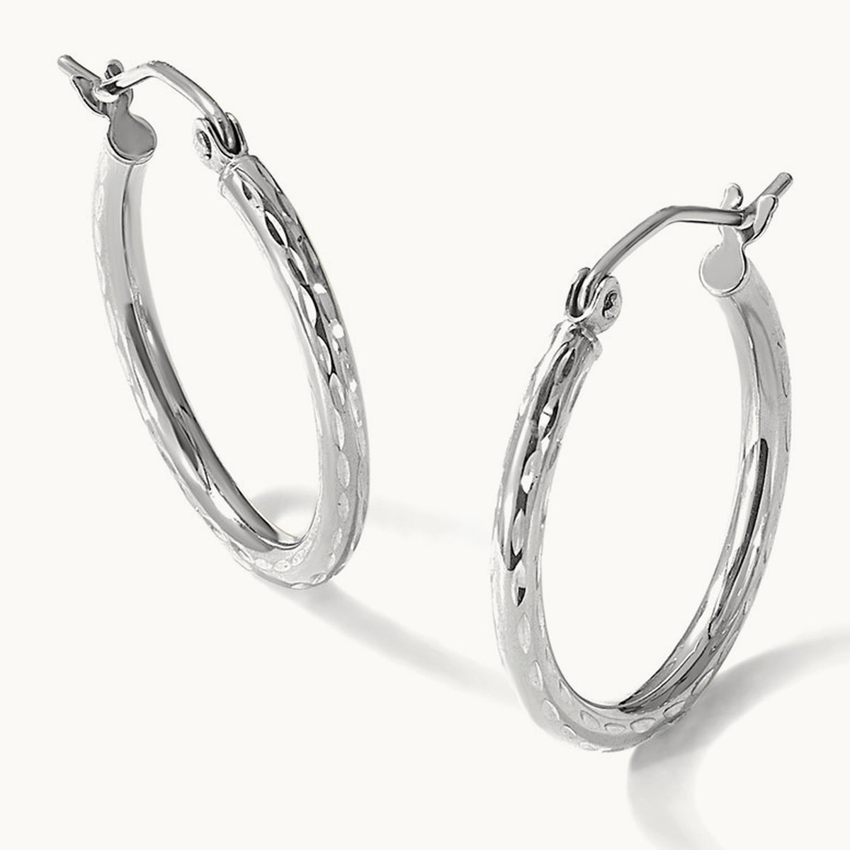 Diamond-cut Round Tube Hoop Earrings — 10K White Gold