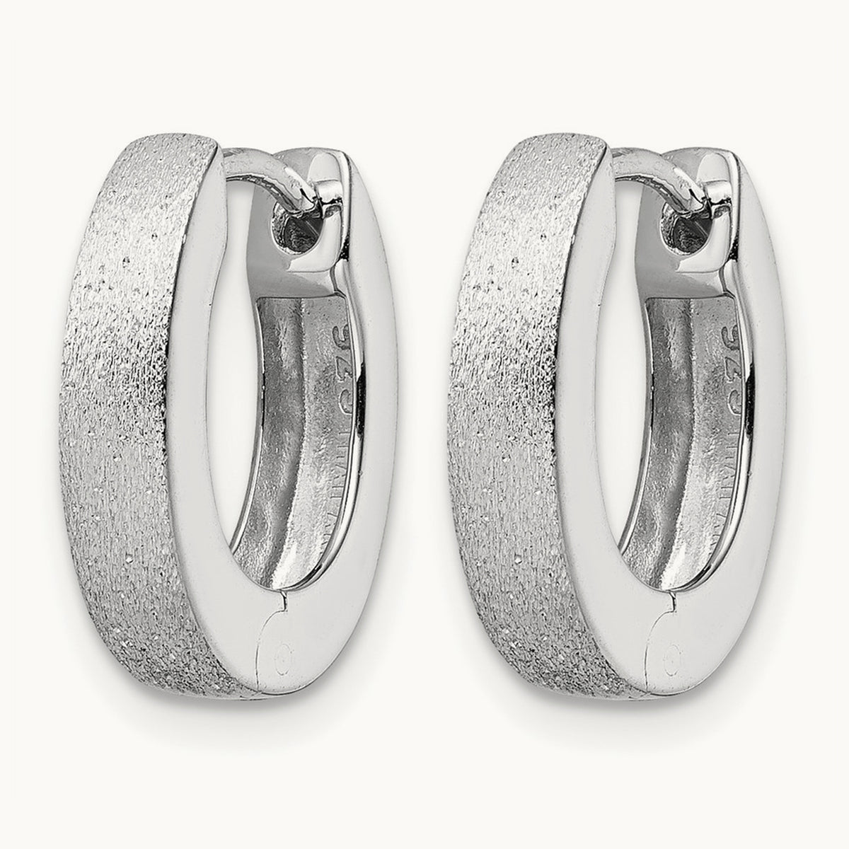 Radiant Essence SS Rhod-plated D/C Brushed Oval Hoop Earrings — Leslie's