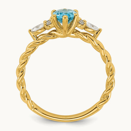 Polished Diamond and Blue Topaz Twisted Ring — 14K Yellow Gold