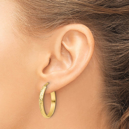 Polished Diamond-cut Oval Hoop Earrings — 14K Yellow Gold