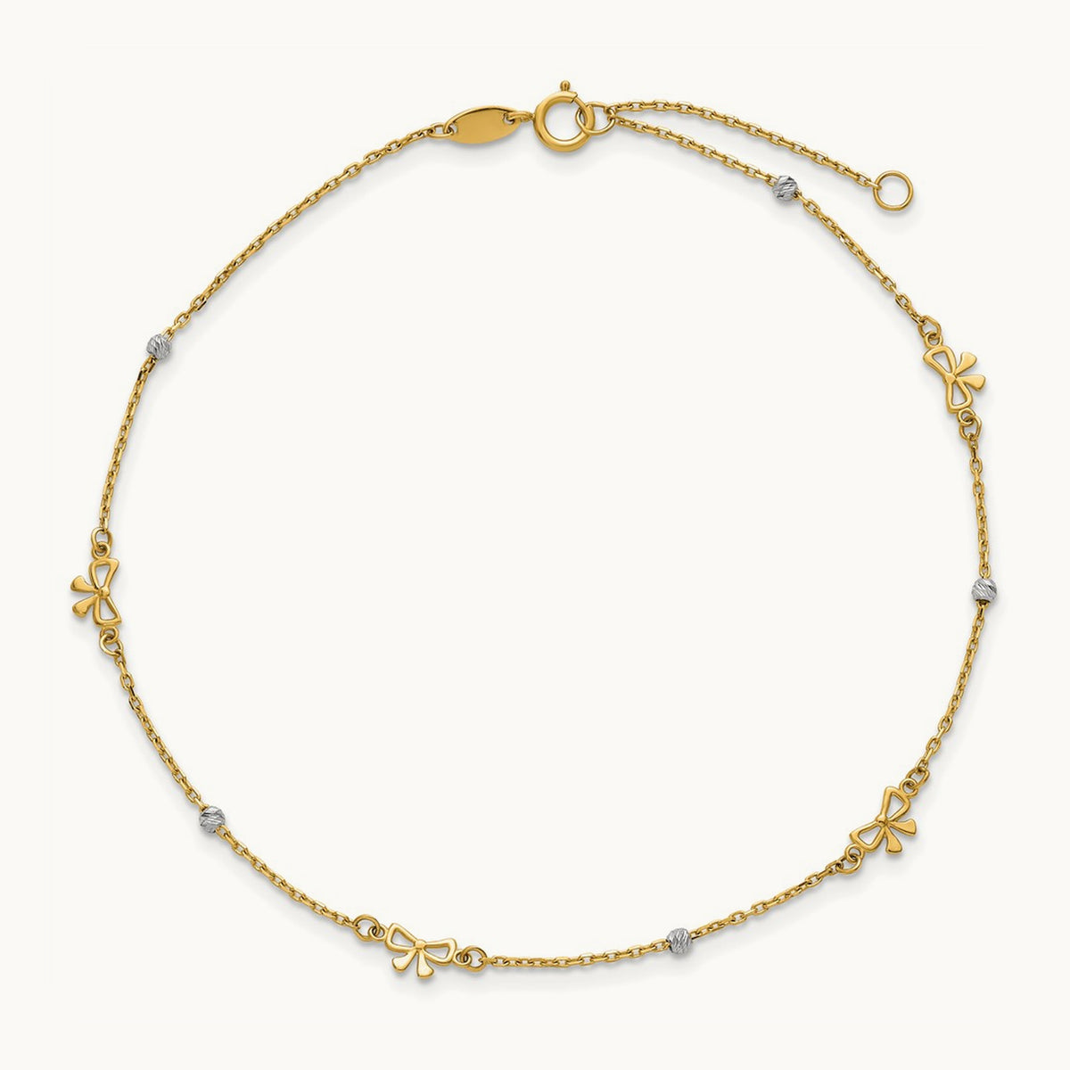 Polished 9in Plus 1in ext. D/C Bead and Bows Anklet, 14K Two-tone