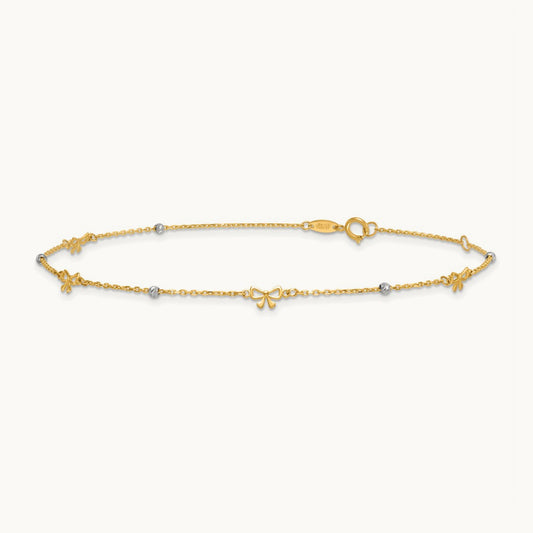 Polished 9in Plus 1in ext. D/C Bead and Bows Anklet, 14K Two-tone