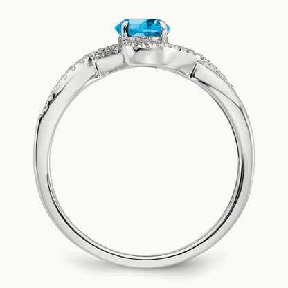 Oval Blue Topaz and Diamond Twist Ring, 14K White Gold