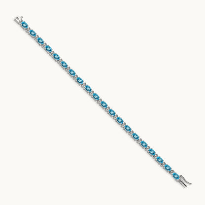 Oval Blue Topaz and Diamond Bracelet, 14K White Gold