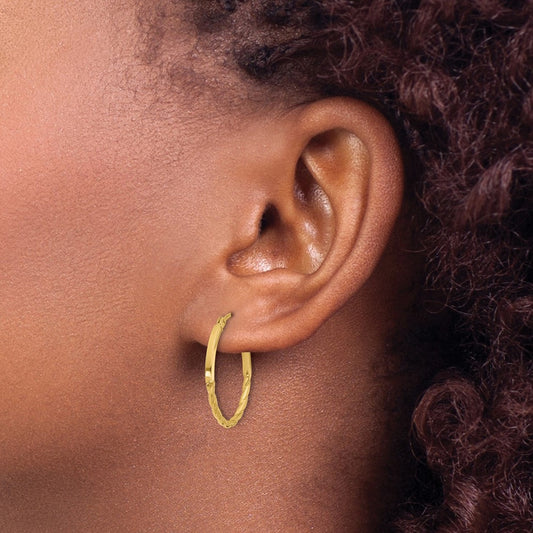 Polished Twist Oval Hoop Earrings — 10K Yellow Gold