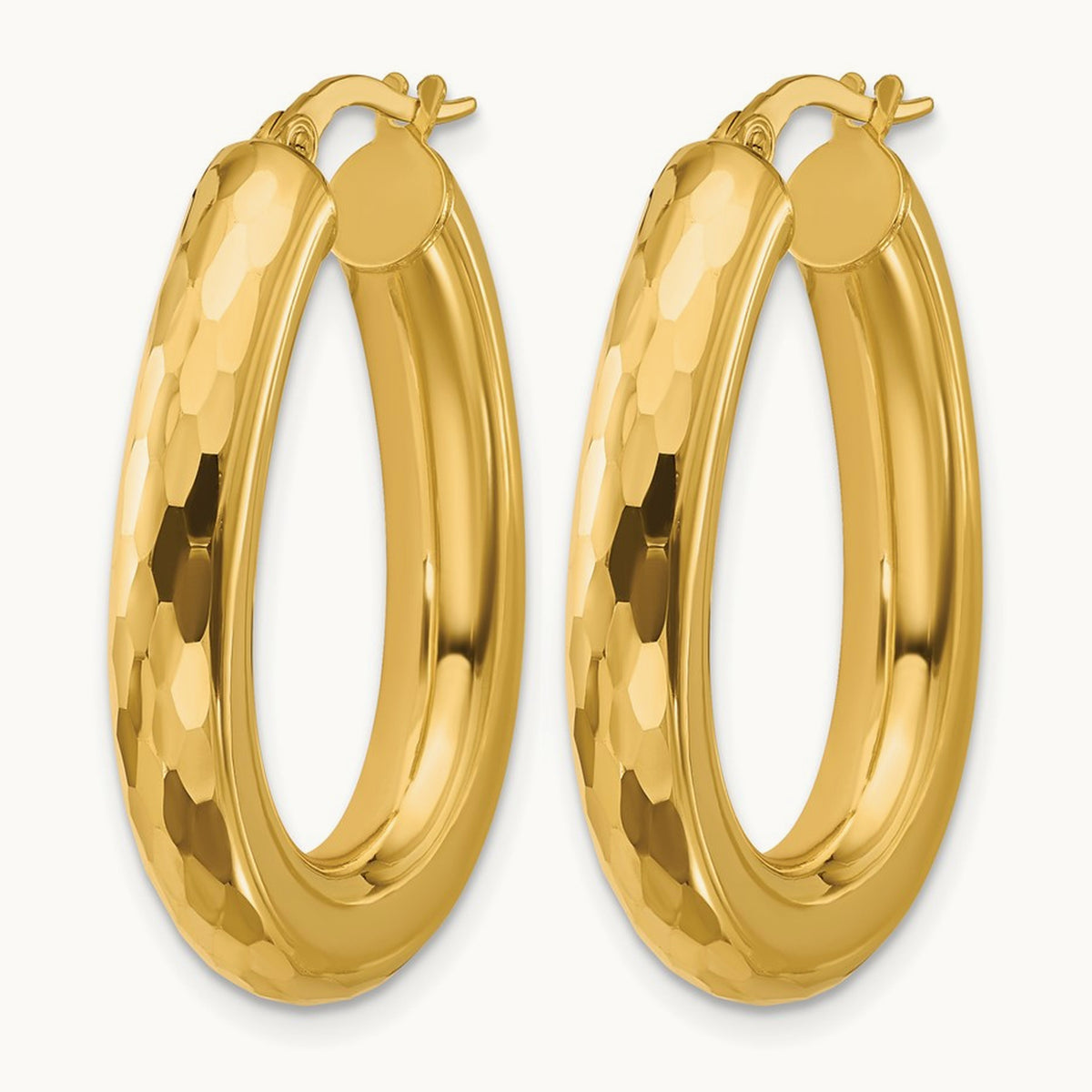 Polished and Diamond-cut Oval Hoop Earrings — Leslie's — photo set