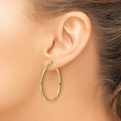 Diamond-cut Round Tube Hoop Earrings — 10K Yellow Gold