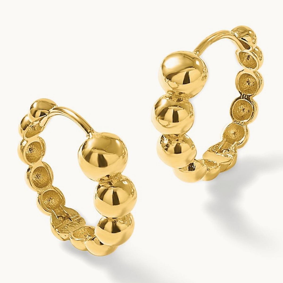 Polished Beaded Hoop Earrings — Leslie's — photo set