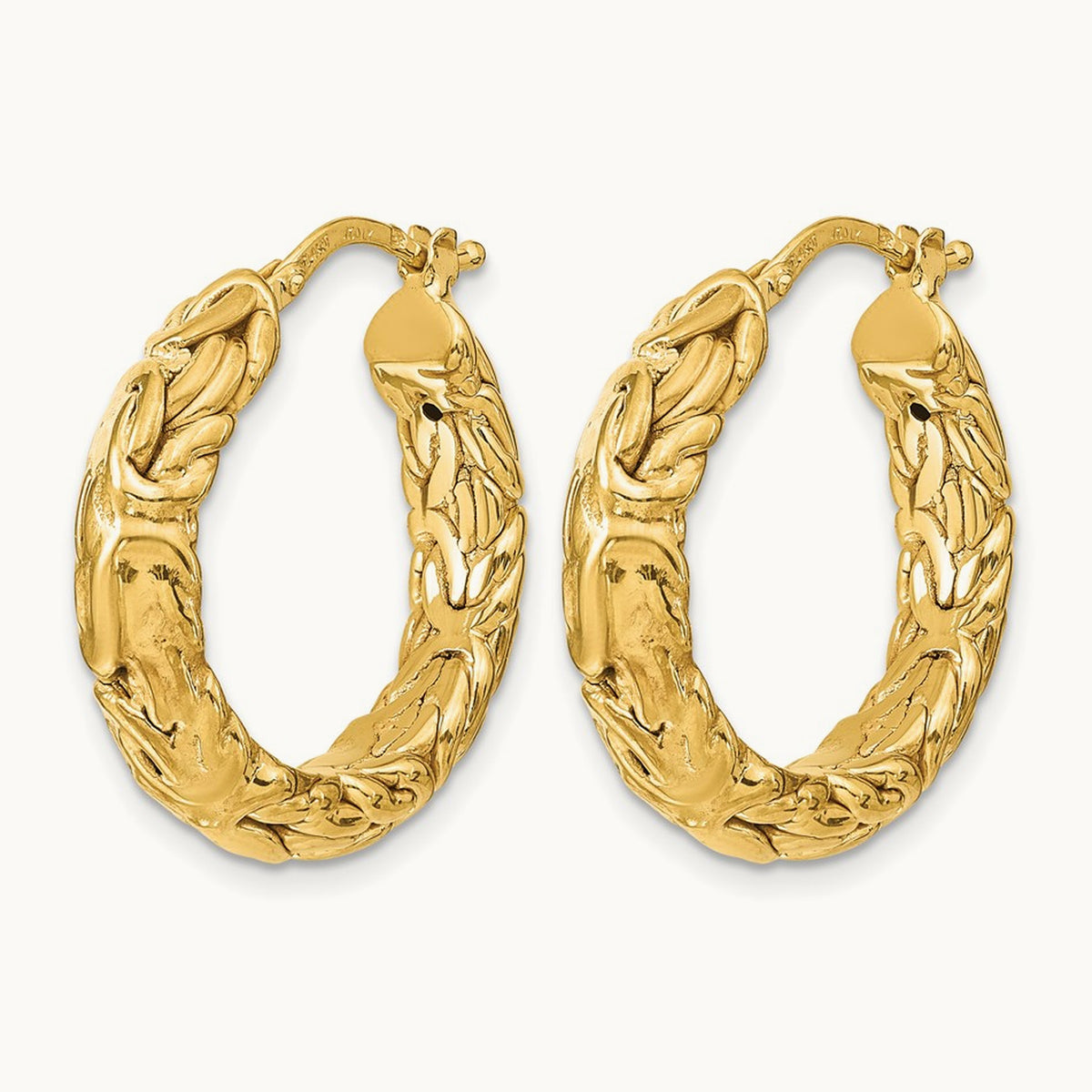 Polished Textured Hoop Earrings — Leslie's — photo set