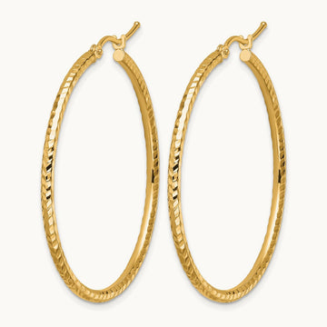 Diamond-cut Round Tube Hoop Earrings — 10K Yellow Gold