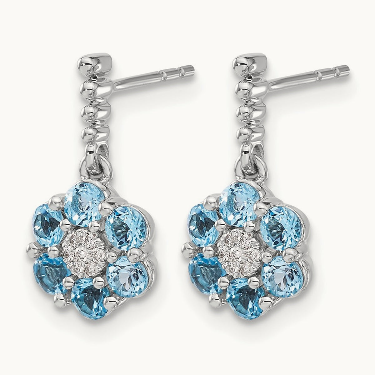 Blue Topaz and Diamond Earrings — photo set