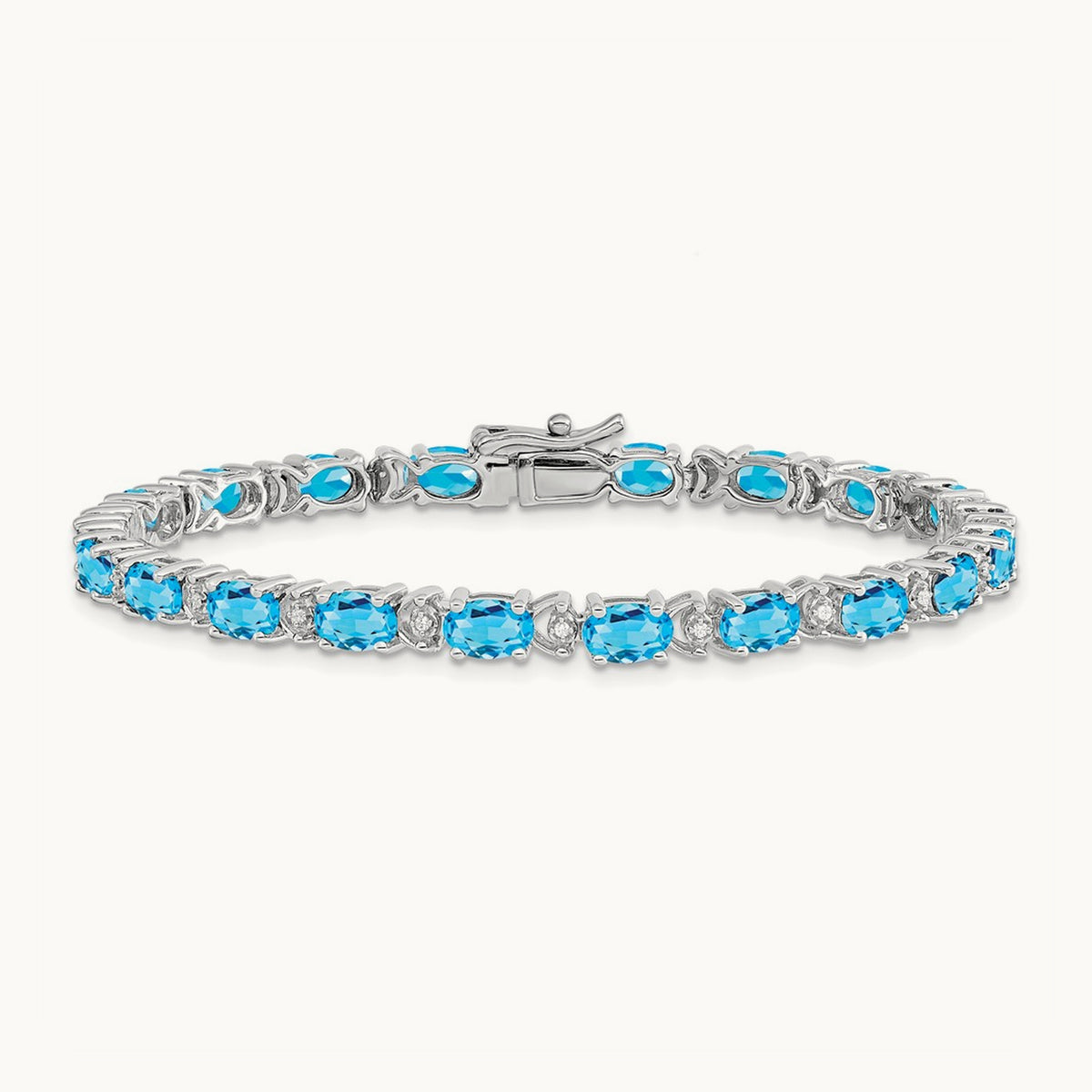 Oval Blue Topaz and Diamond Bracelet, 14K White Gold