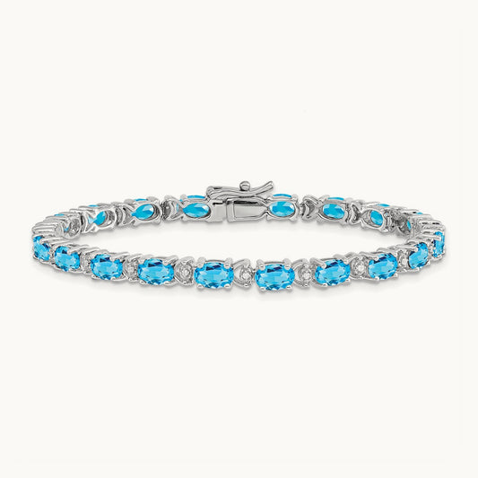 Oval Blue Topaz and Diamond Bracelet, 14K White Gold