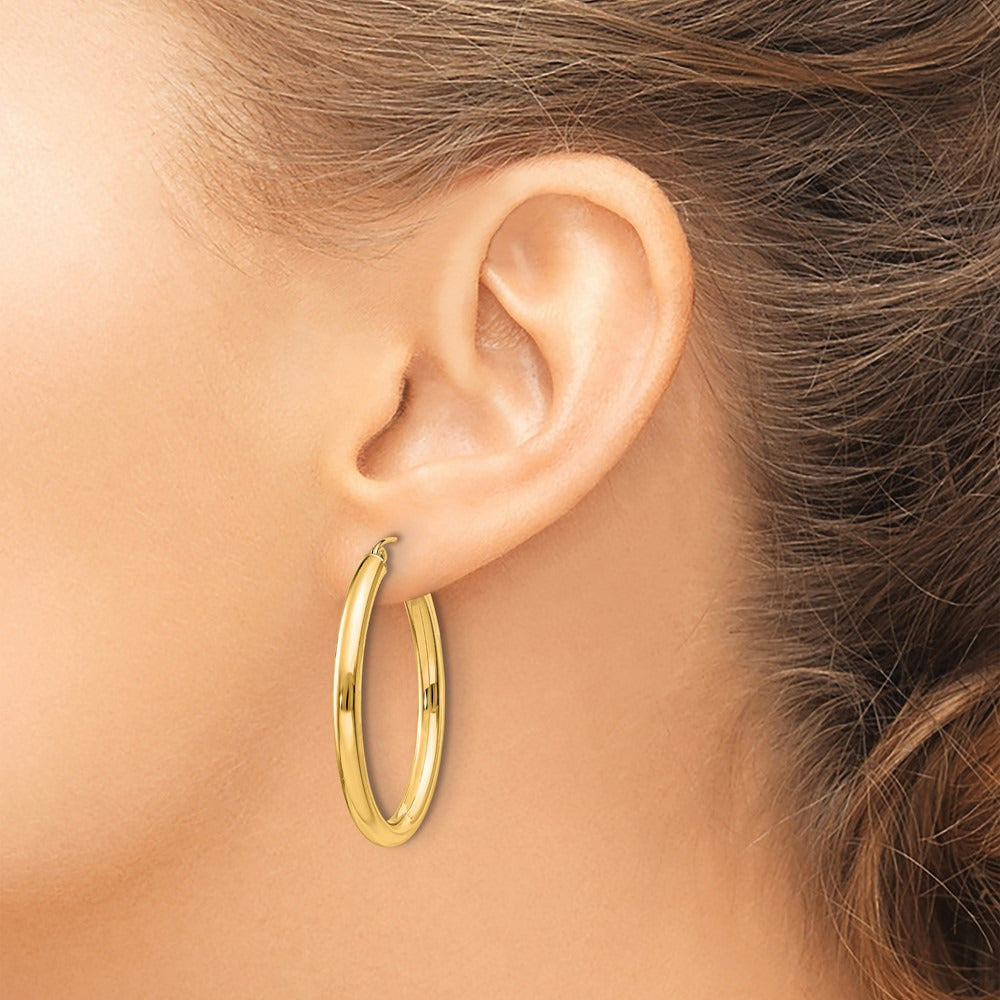 Polished Oval Tube Hoop Earrings — 14K Yellow Gold