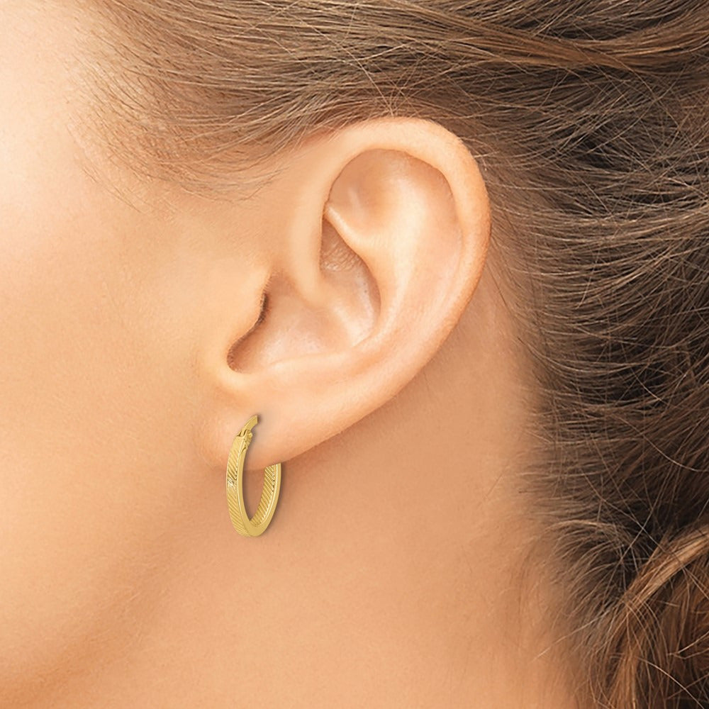Polished and Textured Oval Hoop Earrings — Leslie's — 18mm