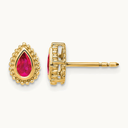 Pear Ruby Post Earrings — 14K Yellow Gold