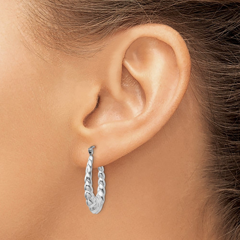 Polished and Textured Oval Hoop Earrings — photo set